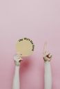 Person Holding White Round Ornament