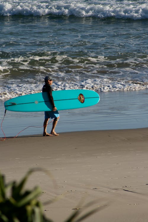 Foto d'estoc gratuïta de byron bay, fent surf, tauler llarg