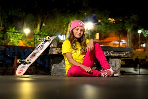 A Young Skateboarder in Casual Wear