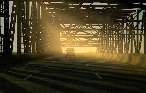 Free A Motor Vehicle Passing the Bridge Stock Photo
