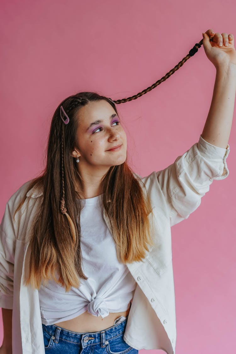 A Woman Touching Her Hair