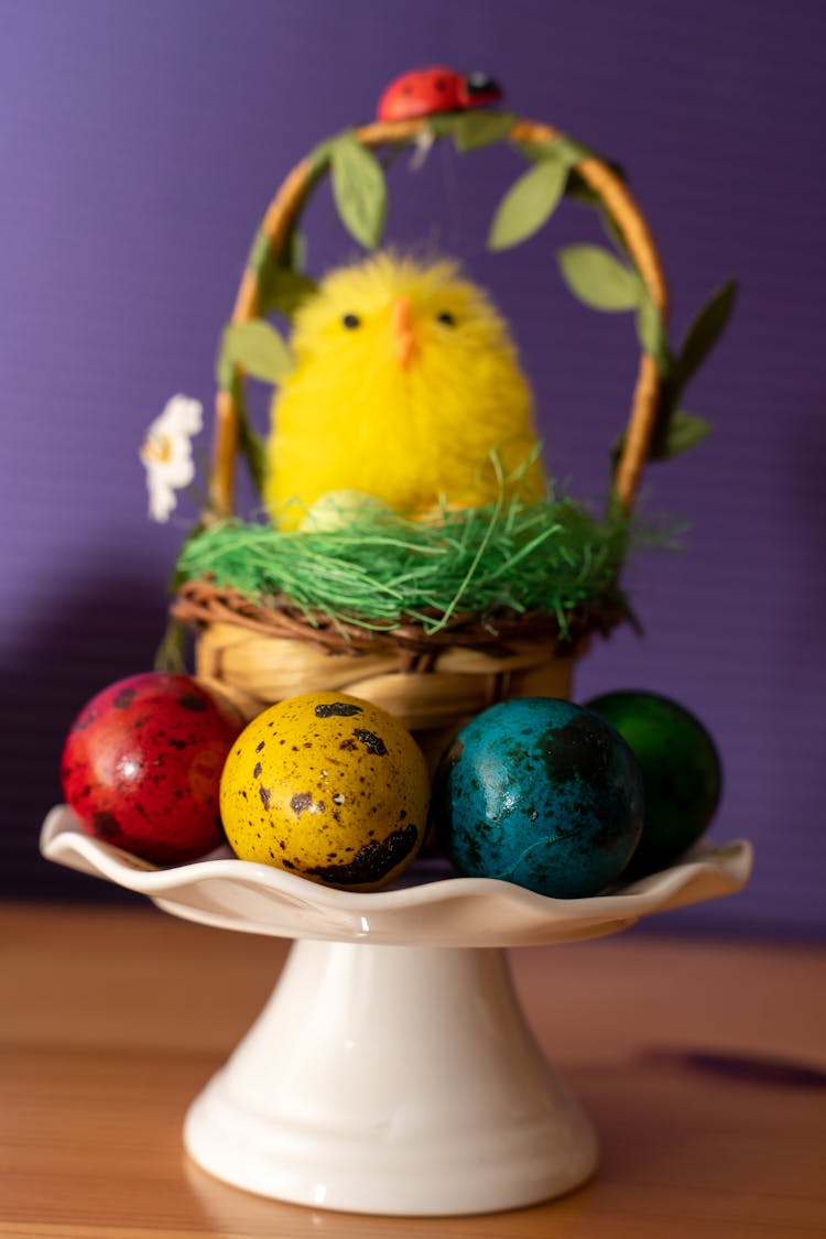 Yellow Chicken On A Woven Basket