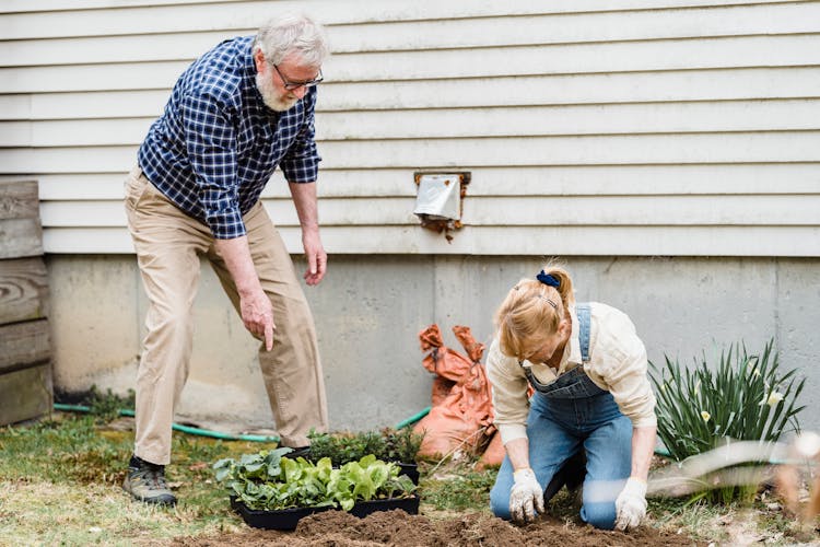 Senior Man And Woman In Garden