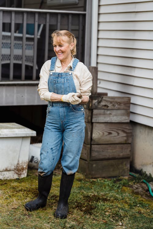 Happy senior woman in backyard