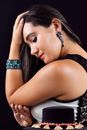 Woman Wearing Lace Tank Top Holding Her Head