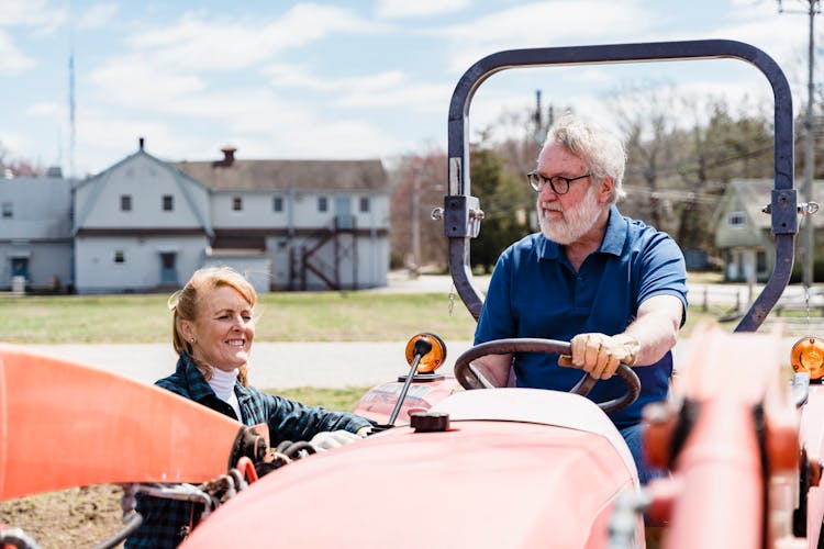 Farmer Operating Agricultural Machinery