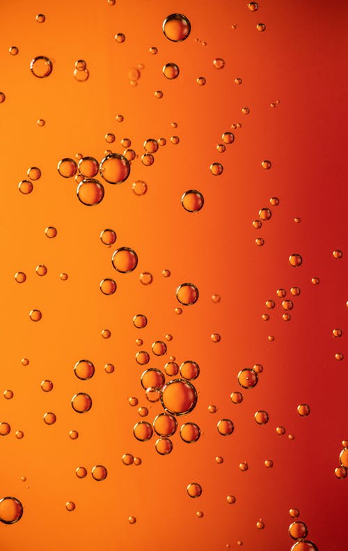 Free Close-Up Photo of Orange Bubbles  Stock Photo