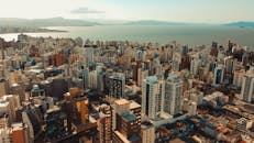Aerial View of City Buildings Near Body of Water