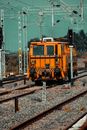 Yellow and Black Train on Rail Tracks