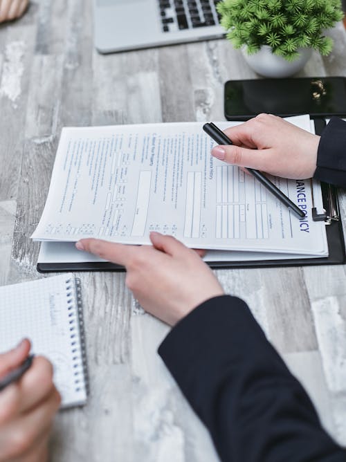 Person Holding a Document