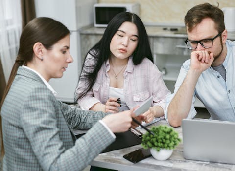 A diverse group of professionals collaborating during an office meeting.