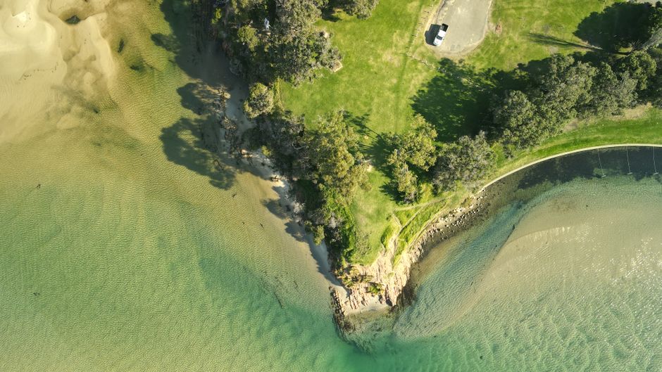 Hunter Valley Romantic Bubbly Breakfast Helicopter Tour from Cessnock - Stunning aerial view of a coastal landscape near Mallacoota, Victoria, Australia.