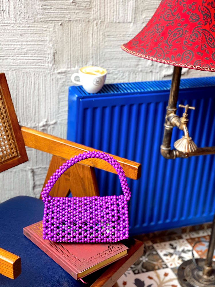 Purple Handbag On A Chair