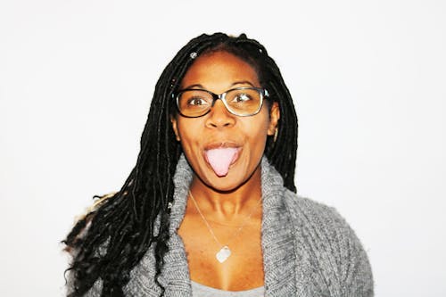 Free Photography of Woman Showing Her Tongue Stock Photo