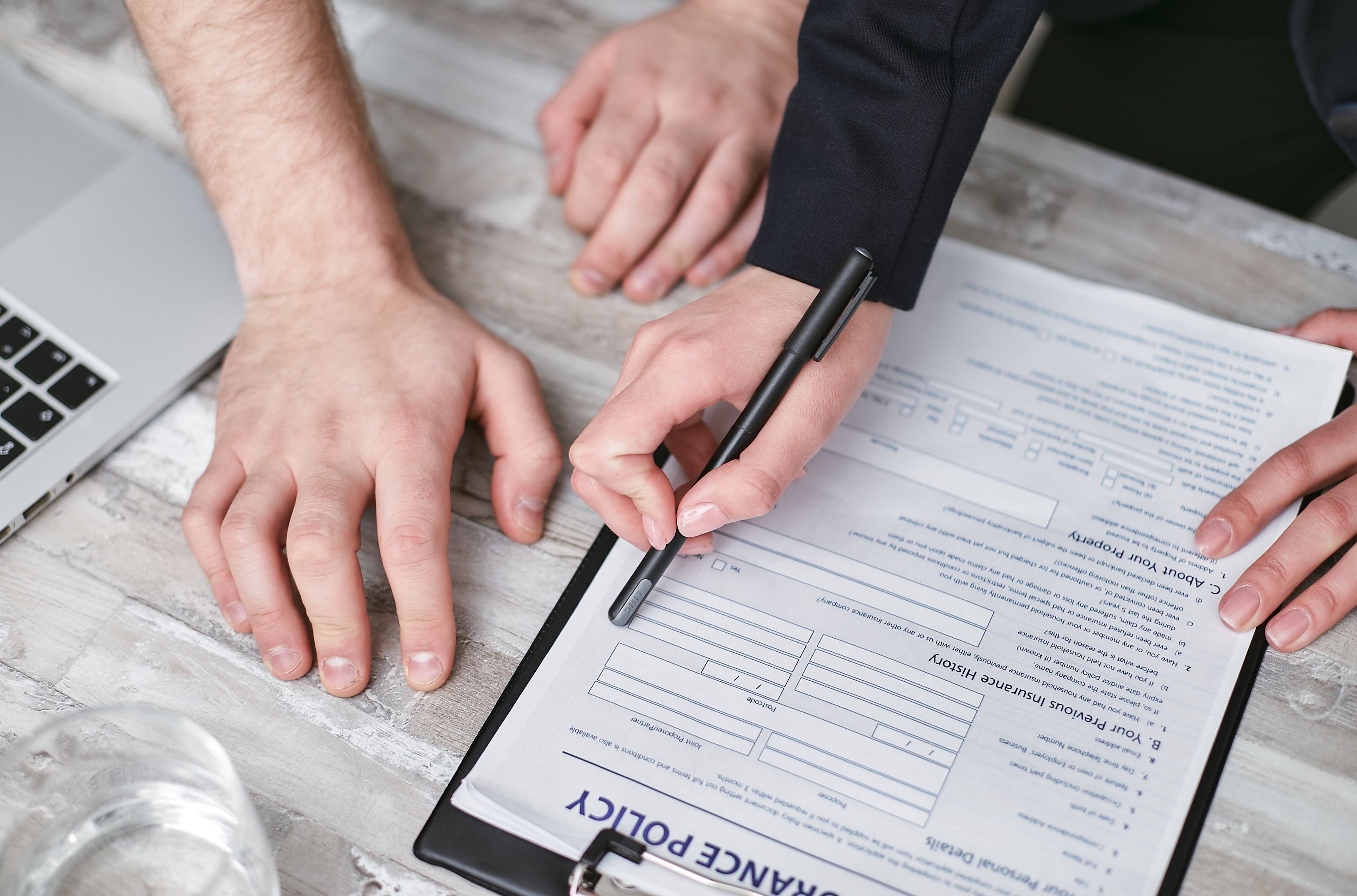 Image File Name: homeowner-insurance
Image Alt Text: Homeowner reviewing insurance documents on a table
Image Caption: Understanding insurance costs helps buyers budget beyond the mortgage payment.