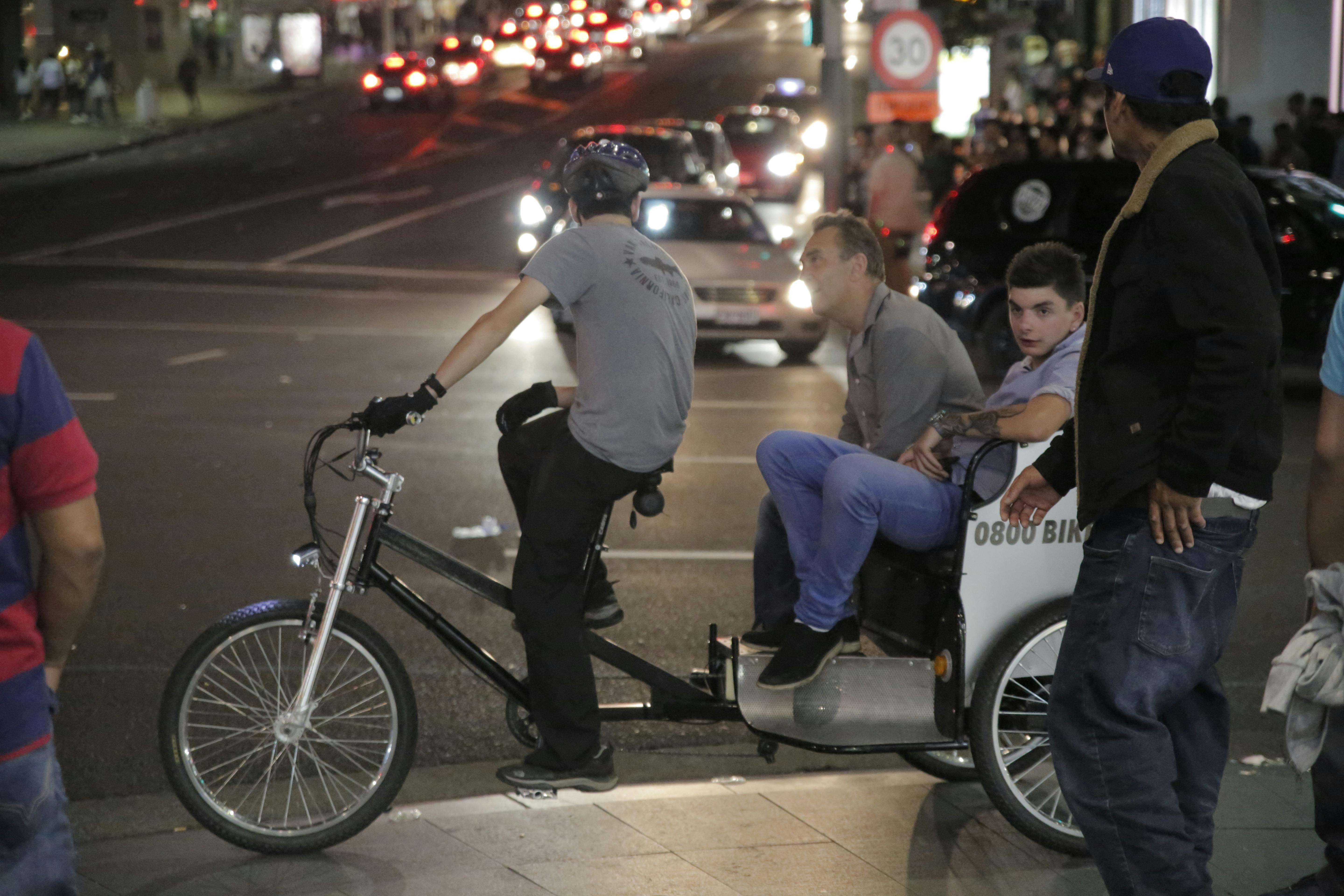Close-up of hands of family members gathered together in support
