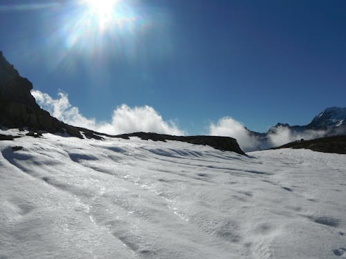 Immagine gratuita di montagne, neve, nuvole