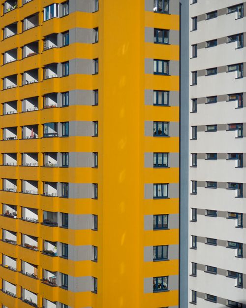 Free Brightly colored high-rise buildings showcasing modern architecture in Berlin, Germany. Stock Photo