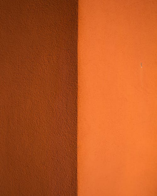 Close-Up Shot of a Brown and Orange Wall
