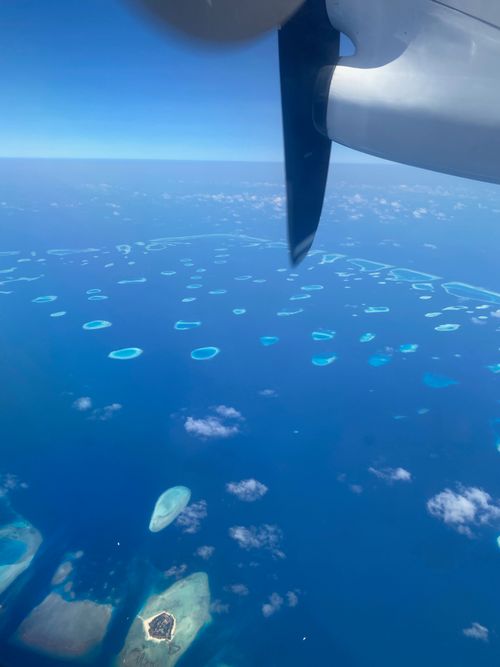 Free stock photo of airplane, airplane wing, archipelago Stock Photo