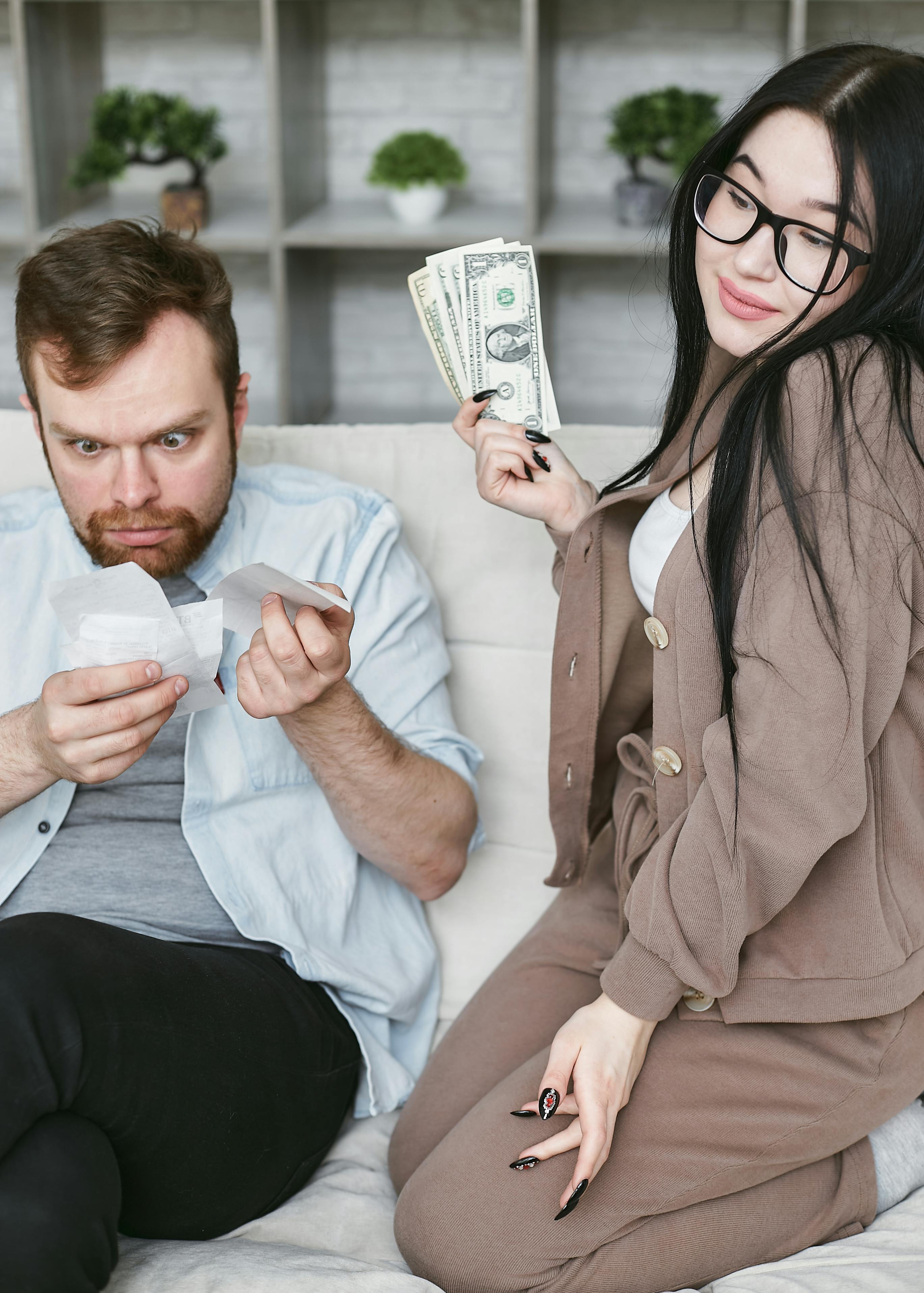 Couple reviewing finances and expenses together