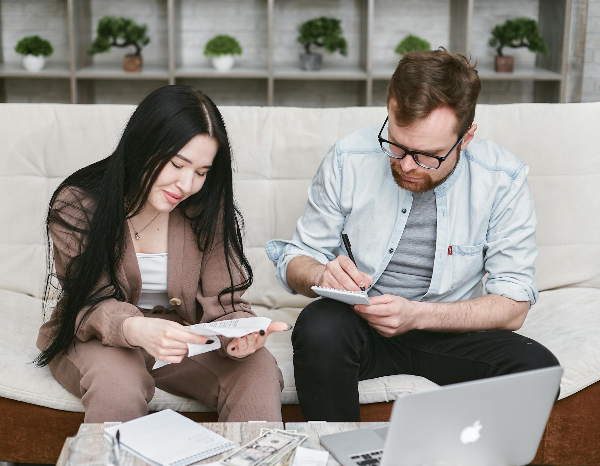 A Man and Woman doing Finance