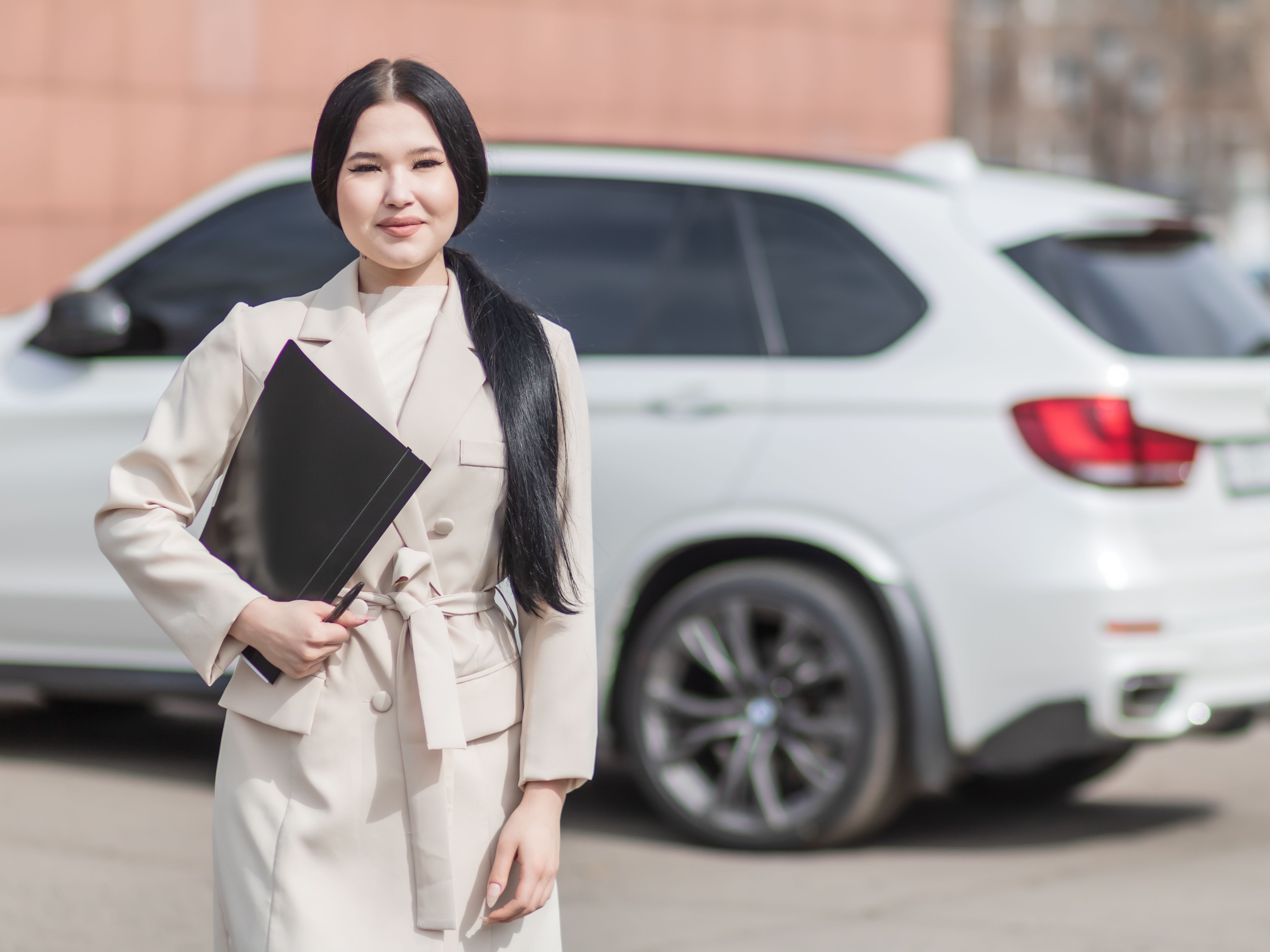 Woman holding insurance documents