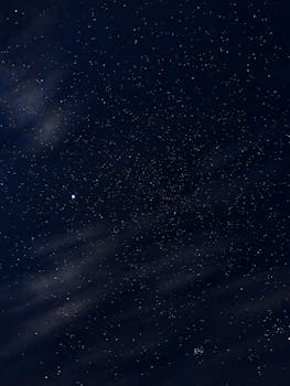 Majestic night sky filled with stars and gentle clouds, perfect for cosmic explorers.