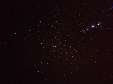 Captivating view of stars shining in the vast night sky, showcasing the beauty of the cosmos.