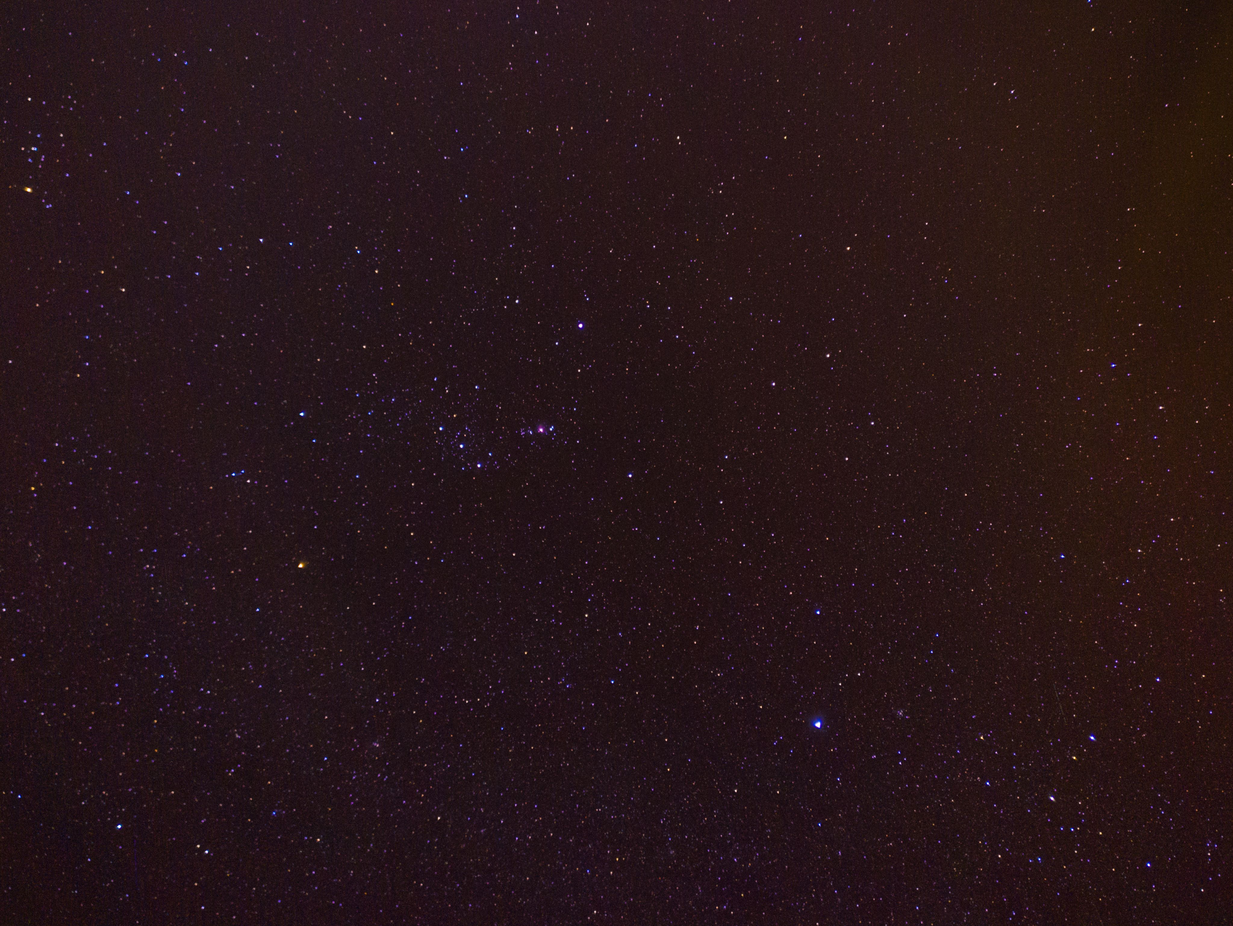 A breathtaking view of the night sky, showcasing countless stars and constellations under a dark, serene setting.