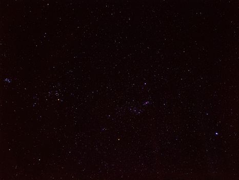 A breathtaking view of a starry night sky featuring the Orion constellation beautifully captured.