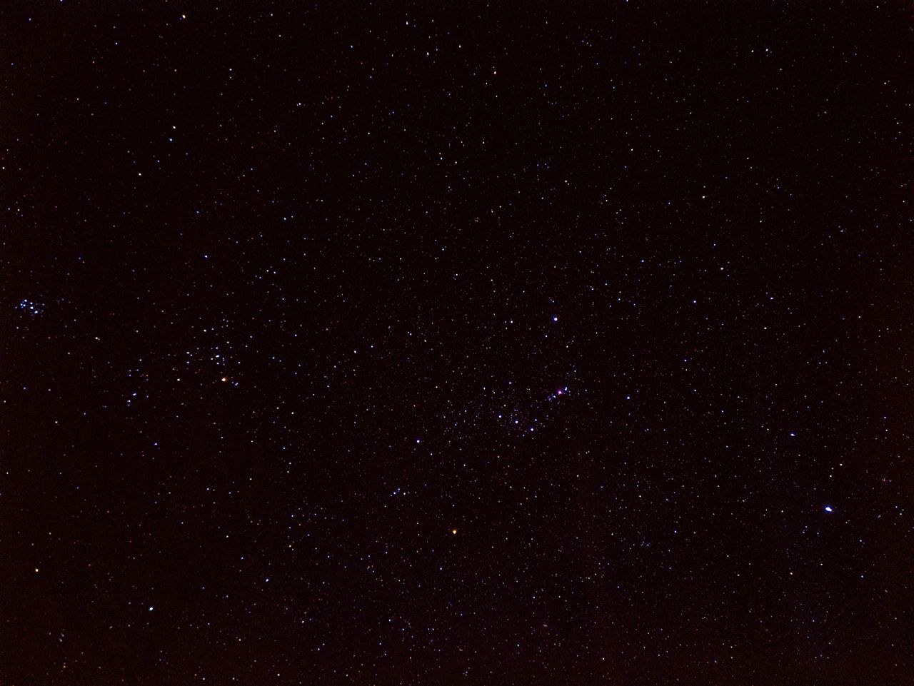 a breathtaking view of a starry night sky featuring the orion constell