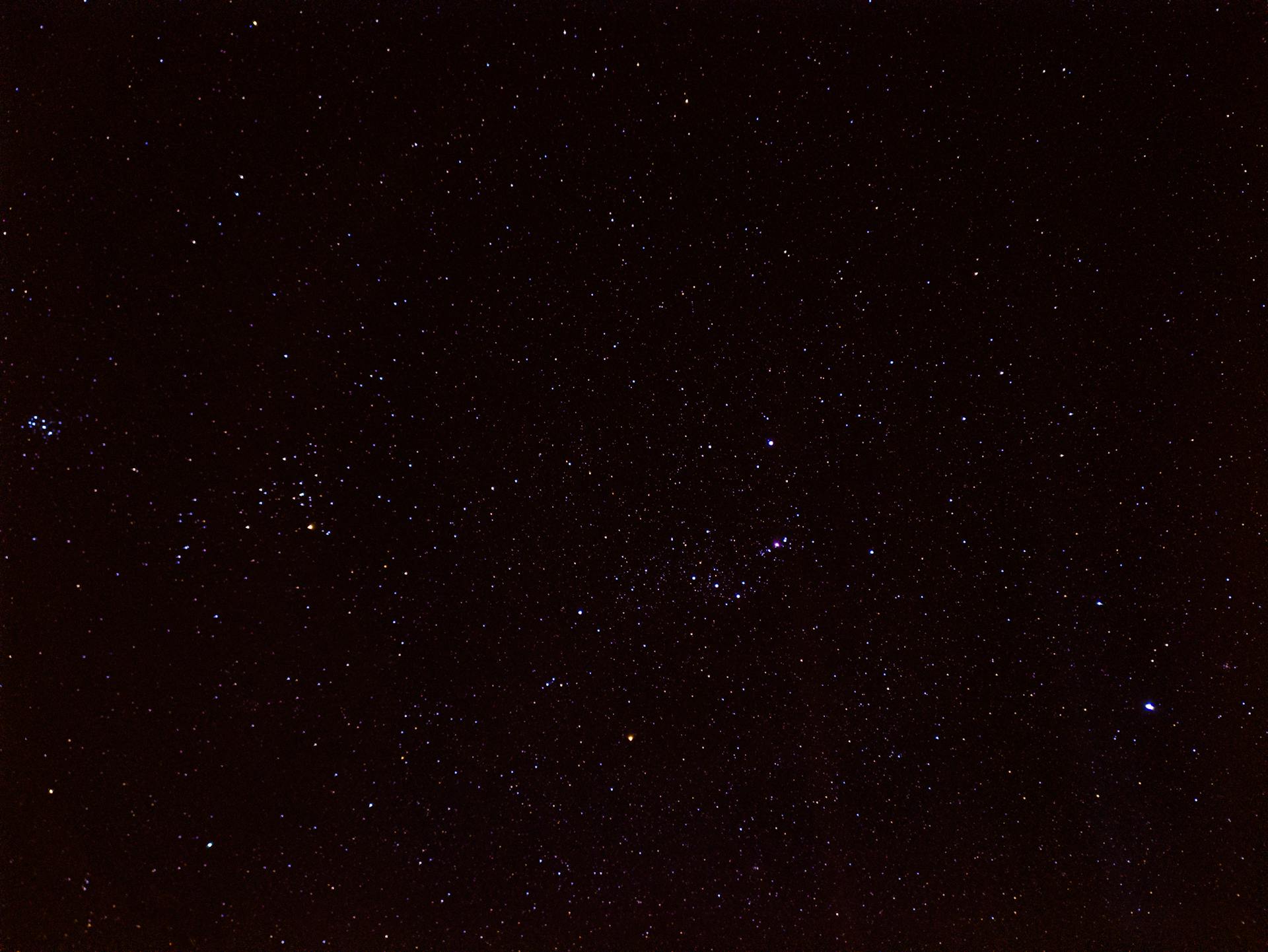 A breathtaking view of a starry night sky featuring the Orion constellation beautifully captured.