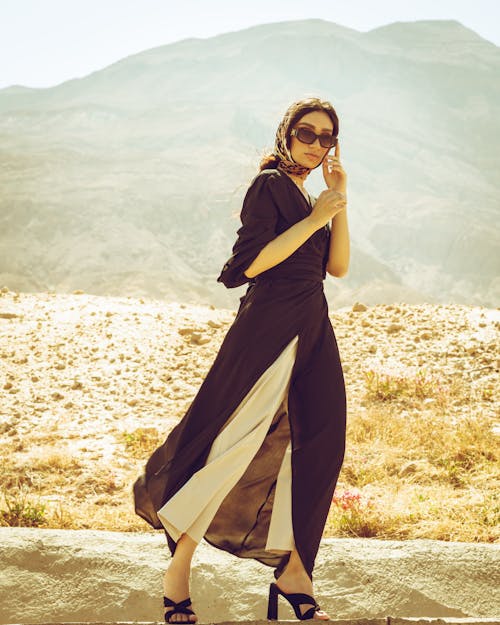 Photograph of a Fashionable Woman Wearing Black Sunglasses