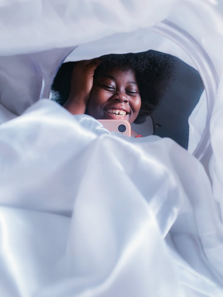 Mirror On White Fabric With Image Of Woman