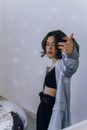 Young woman near disco ball