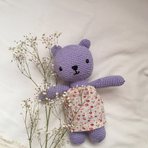 Purple Teddy Bear Stuffed Toy Near Babys Breath Flowers