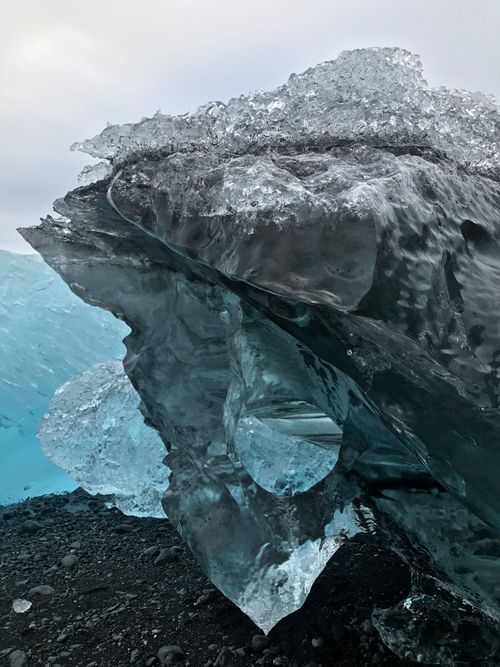 Free Close-up of an intricate blue iceberg in Iceland's unique landscape. Stock Photo