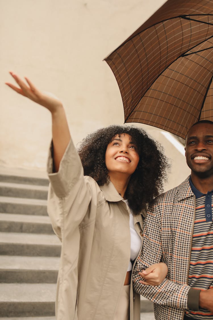 Couple With Brown Umbrella