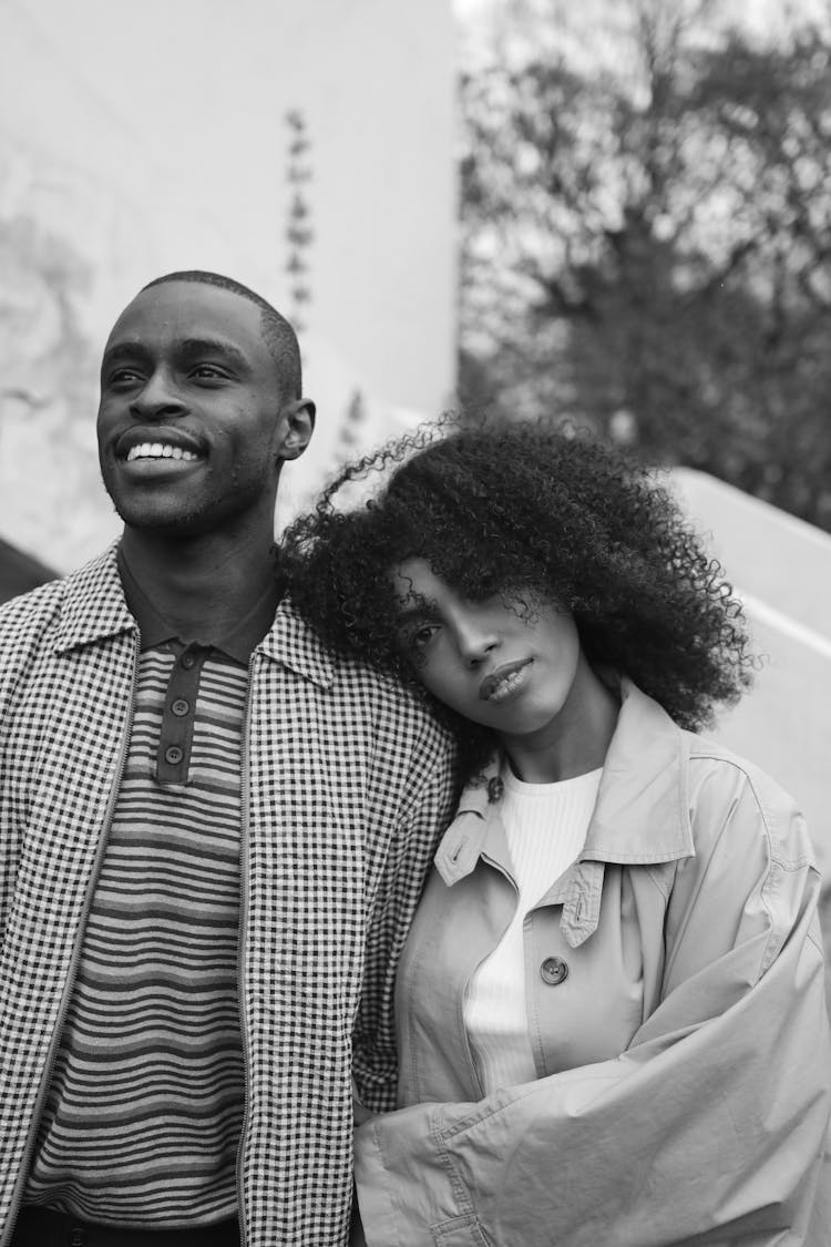 Woman Leaning Head On Mans Shoulder