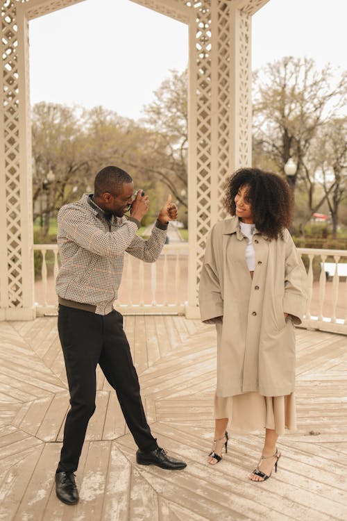 Man Taking Picture of His Girlfriend