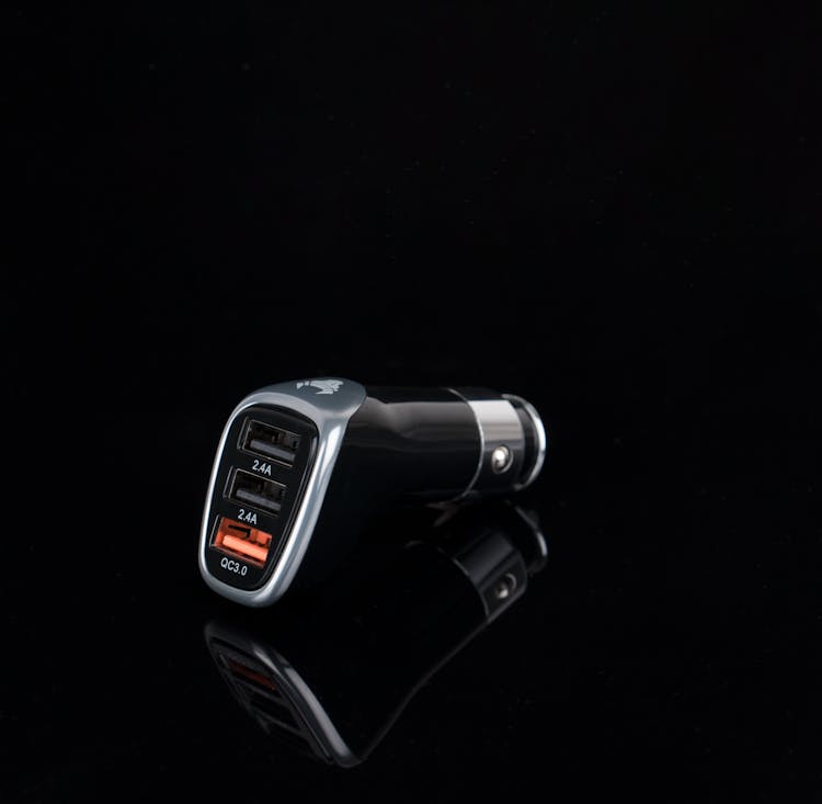 A Black And Silver Car Charger