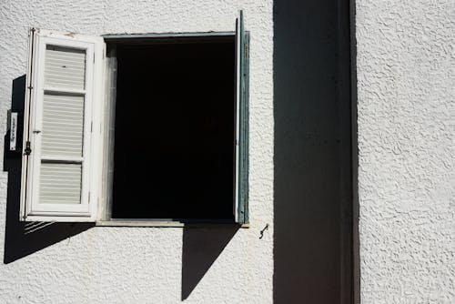An Open Window on a Sunny Day