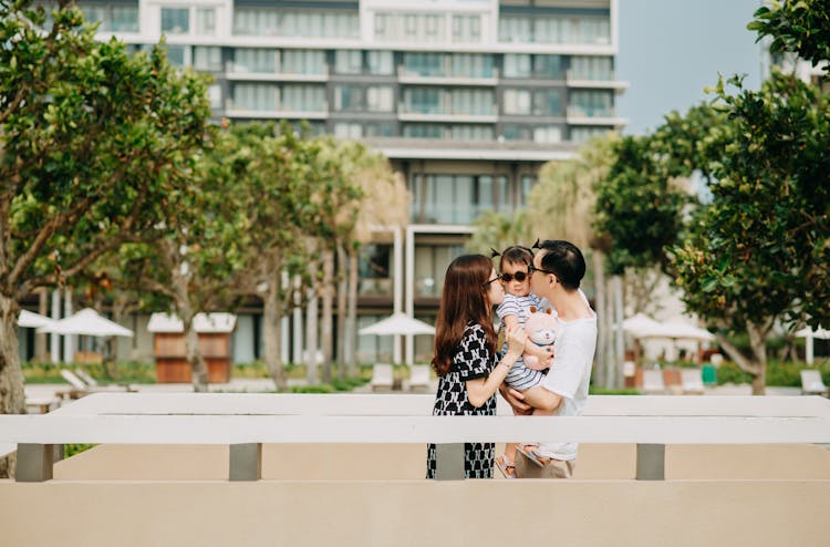 Young Happy Family On Vacation