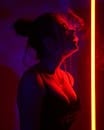 Woman in Dark Room Exhaling Smoke