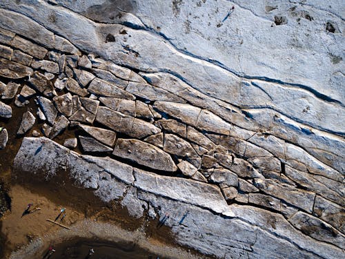 Gray Concrete Surface with Cracks and Stain