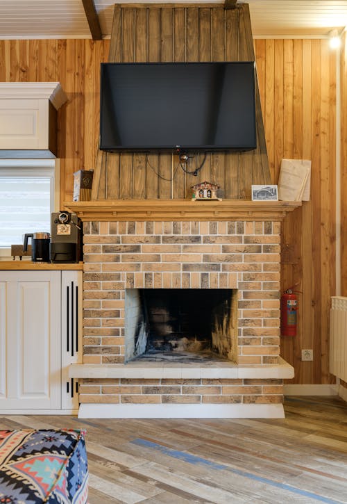 A Fireplace with a Television