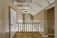 White Wooden Staircase on Brown Wooden Floor