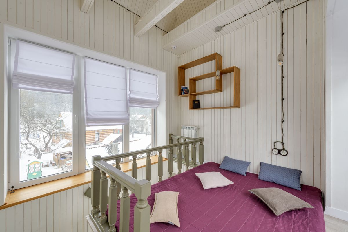 Chambre de chalet au linge soigné, préparée entre deux séjours à l’Alpe d’Huez