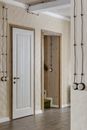 White Wooden Door Near Brown Wooden Table